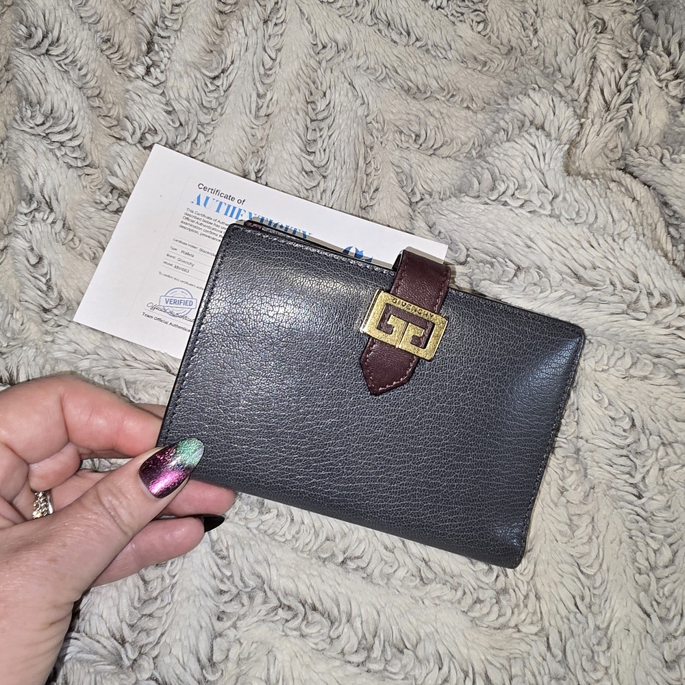 Classic Black Leather Wallet with Brown Accent and Gold Hardware
